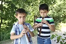 Boys play recorders