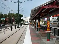 A train departing the side platform of North Killingsworth station