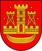 A coat of arms depicting a golden castle with three turrets surrounded with four golden stars all on a red background