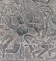 Bas-relief of uppercut with a knee strike. Located at Angkor Wat(1100's A.D.) in the Kingdom of Cambodia