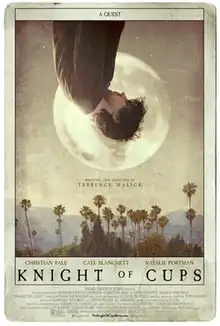 The poster resembles a tarot card, with a man upside down facing sideways at the top, haloed by the moon. Below him are California palm trees with the Santa Monica Mountains in the background. Above the man is the tagline: "A Quest", and below the palm trees are the credits and title.