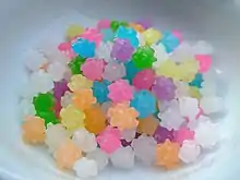 Small, knobby pieces of candy, in different colors