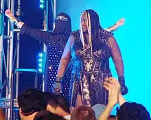 Awesome Kong with Raisha Saeed during her entrance at Bound for Glory IV