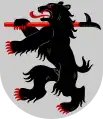 Arms of Kontiolahti featuring a bear (kontio in Finnish), carrying a log driving pike pole referring to the importance of forestry in the region's economy