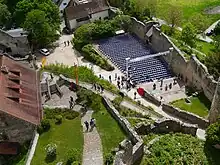 overhead view of the outer bailey of Rötteln castle with the open air theatre