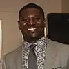 Headshot of LaDainian Tomlinson wearing a suit