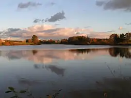 The château of Rortheau beyond the lake