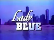 A cityscape, with the title "Lady Blue" superimposed on it