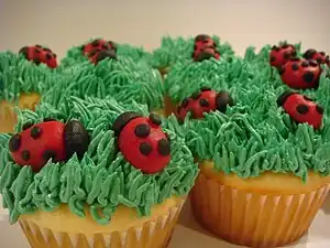 Cupcakes decorated with green buttercream frosting