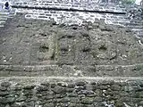 Detail from front wall (right side facing front) of the High Temple. Heavily eroded.