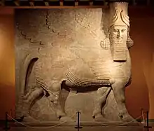 Initially depicted as a goddess in Sumerian times, when it was called Lamma, it was later depicted from Assyrian times as hybrid of a human, bird, and either a bull or lion under the name Lamassu. It appears frequently in Mesopotamian art.