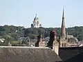 The Ashton Memorial seen from Lancaster city centre, with the spire of Lancaster Cathedral