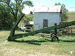 Grain conveyor on a farm near Belle