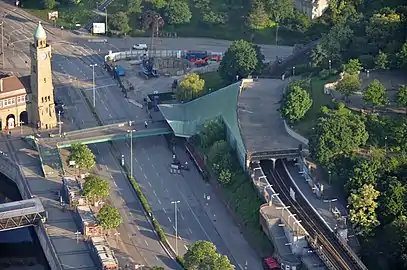 Aerial view of the station (right) and the tower of St. Pauli Piers (left)