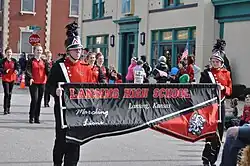 Lansing High School band marching in the 2015 Veterans Day Parade