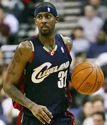 Larry Hughes with the Cavaliers in April 2007 dribbling a ball