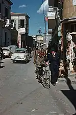 Pedestrians in a narrow city street