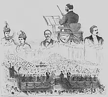 Drawing of scenes from the festival premiere of The Golden Legend showing the chorus, the faces of the principal singers and Sullivan's back, as he stands conducting. Black and white.