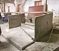 Cattle stalls with slate partition and water trough