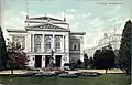 Second Gewandhaus (c. 1910), built to replace the first, which was renovated and repurposed. Severely damaged in two separate air raids on 4 December 1943 and 20 February 1944 during the bombing of Leipzig in World War II. Ruins demolished in 1968.