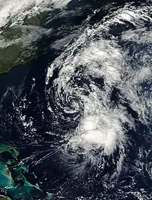 A satellite photo shows a large cloud to the southwest of Bermuda