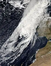 Satellite image of Leslie approaching the Iberian Peninsula from an easterly direction on 13 October, while becoming a tropical-storm-force extratropical cyclone