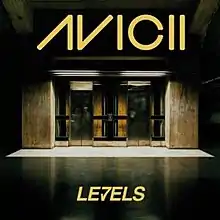 In a building, two elevators in a lobby. The song's title has an "V" is seen as a combined "7" and a checkmark.