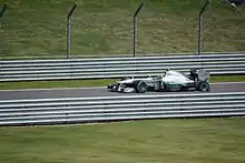 Lewis Hamilton driving into the pit lane