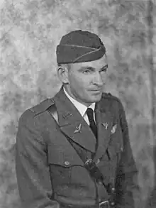 Air Service officer wearing garrison cap and uniform with Sam Browne belt.