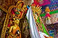 Statues of buddhas at Litang Monastery of the Tibetan tradition.