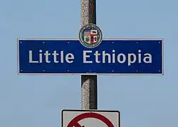 Little Ethiopia neighborhood sign located at the intersection ofFairfax Avenue and Olympic Boulevard