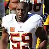 Headshot of London Fletcher wearing his uniform but no helmet