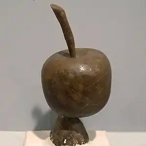 A model of an apple in wax. This is the first step of the lost-wax casting process in bronze