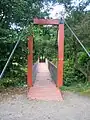 The suspension bridge over the Lugton Water