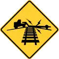 W10-5Low ground clearance railroad crossing