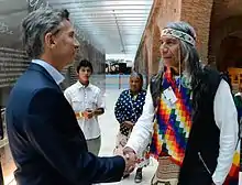 Félix Díaz, a Qom leader, meets with Argentina President, Mauricio Macri wearing traditional dress