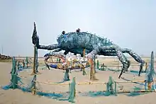 Sculpture of a crab made from discarded plastic