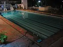 Outdoor swimming pool at night