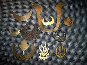 Various Japanese maedate, crests that are mounted in the front of a samurai helmet kabuto.