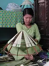 Making conical hats (nón tơi) in Huế countryside, Vietnam