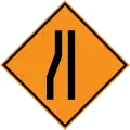 Road narrows on the left