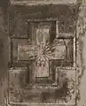 Photograph of a mandala carving on wooden door panel. Fua Mulaku Island, 1986