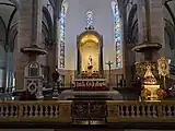 The cathedra, newer high altar, pulpit, altar rail, and the ciborium