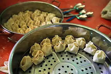 Afghan mantu in a steamer before cooking