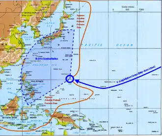 map of the western Pacific. An orange line marking the Japanese defenses runs from the Kuriles to New Guinea and Java. There is an arc showing the range of B-29 bombers that overlaps with Japan and the Philippines