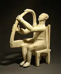 Marble seated harp player, 2800-2700 BC