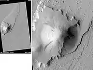 Streamlined Island in Marte Vallis, as seen by HiRISE.  Click on image for good view of dark slope streaks.  Island is just to the west of Pettit Crater.  Scale bar is 500 meters long.