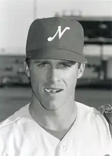 A black and white photograph of a baseball player