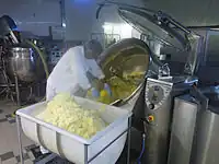 Industrial cooking of mashed potatoes in a steam-jacketed combi kettle