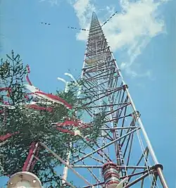 The final section of the Warsaw radio mast (in foreground) is decorated and ready to raise